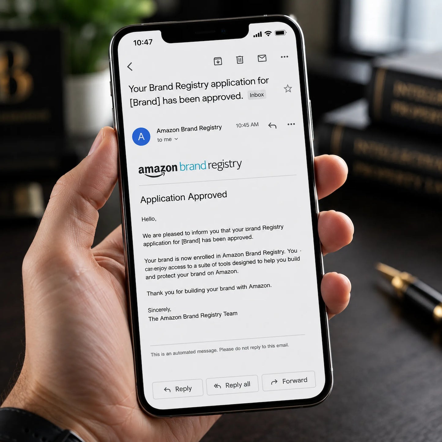 Amazon Brand Registry approval email notification on a smartphone screen after successful appeal